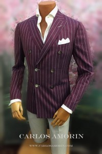 A man in purple and white striped suit jacket.
