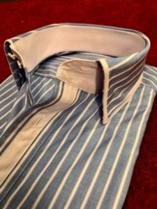 A close up of the collar and cuffs on a shirt